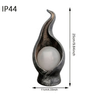 FLAMESTATUE – Solcelledrevet flamme have lampe