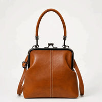 CLASPELLE – Sac bandoulière vintage à fermoir baiser pour un style signature