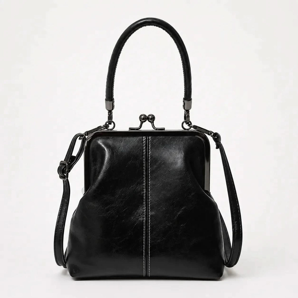 CLASPELLE – Sac bandoulière vintage à fermoir baiser pour un style signature