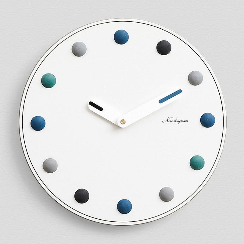 VIBRANIXA – Minimalist Wall Clock for Bright and Lively Spaces