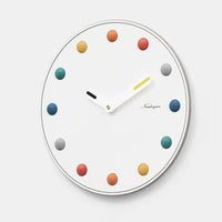 VIBRANIXA – Minimalist Wall Clock for Bright and Lively Spaces