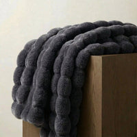 CURVORA – Sculptural Throw Blanket for Cozy Contemporary Spaces
