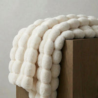 CURVORA – Sculptural Throw Blanket for Cozy Contemporary Spaces