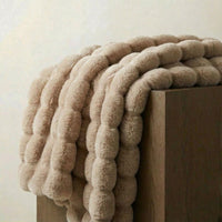 CURVORA – Sculptural Throw Blanket for Cozy Contemporary Spaces