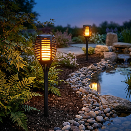 Lights spaced beside a garden pond