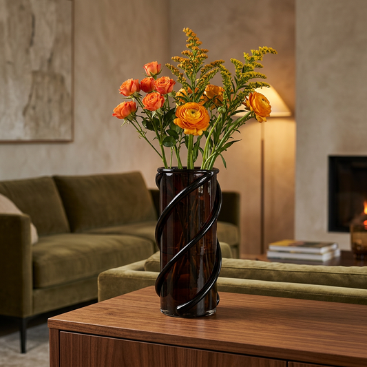 Vase with golden-orange flowers in a cozy living room