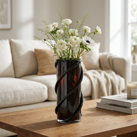 Vase with white flowers in a bright living room