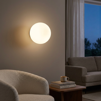 Wall light in a cozy living room at dusk